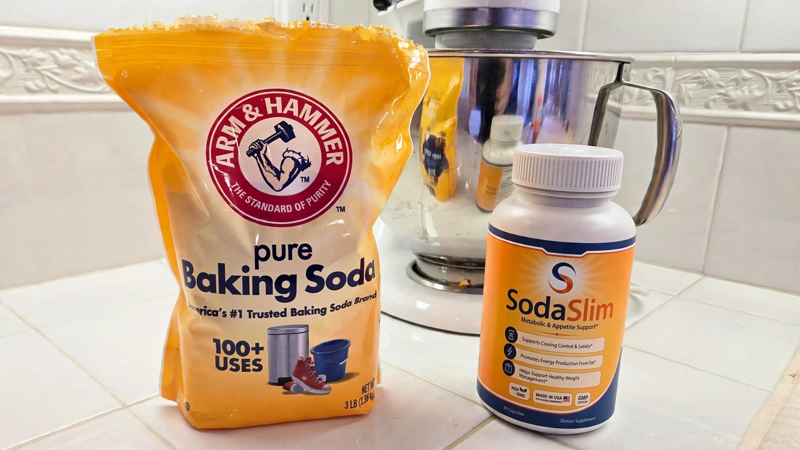 An image shows a bag of Arm & Hammer pure baking soda next to a bottle of SodaSlim weight loss supplements, all in a kitchen counter setting in front of a KitchenAid mixer.